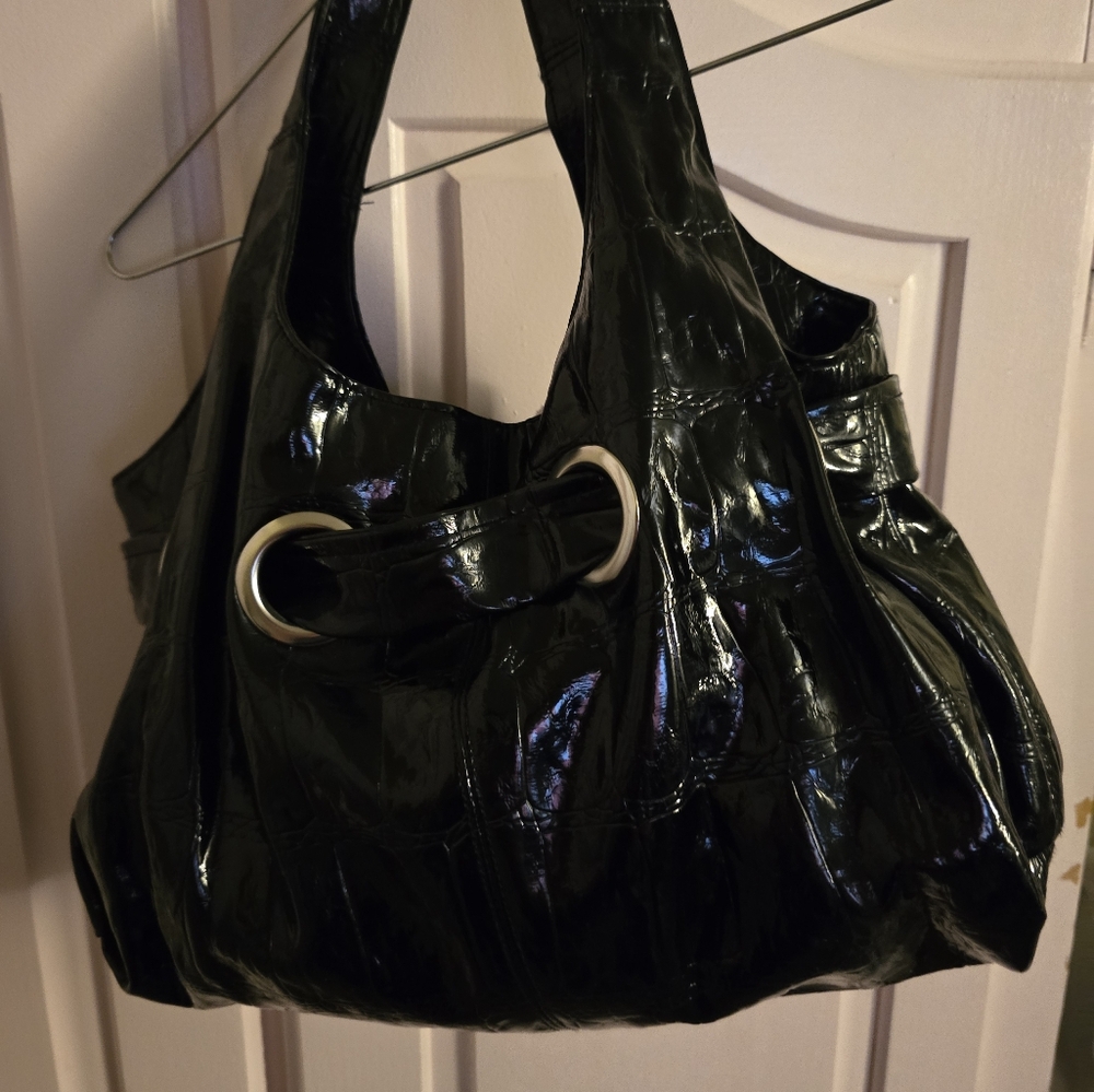 Black soft shiny fashion women's handbag.Brand new, never used.